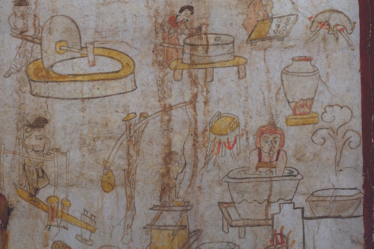 Murals showing people carrying out daily chores