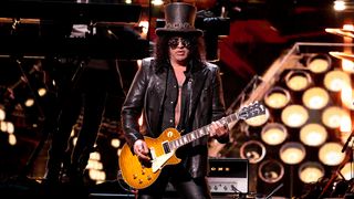 CLEVELAND, OHIO - OCTOBER 19: Slash performs onstage at the 2024 Rock & Roll Hall Of Fame Induction Ceremony at Rocket Mortgage Fieldhouse on October 19, 2024 in Cleveland, Ohio. (Photo by Jeff Kravitz/FilmMagic)