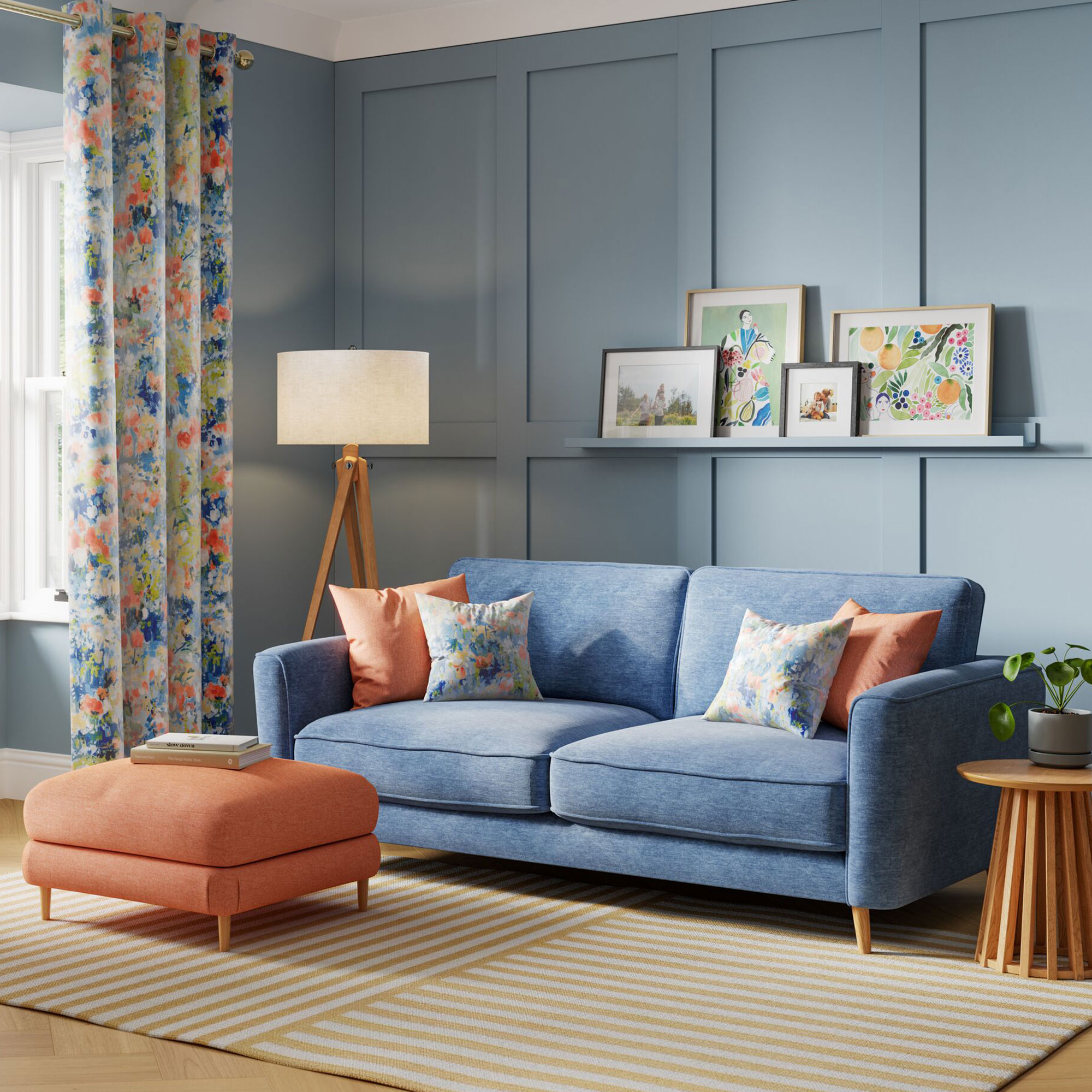 Living room with blue sofa and coral ottoman
