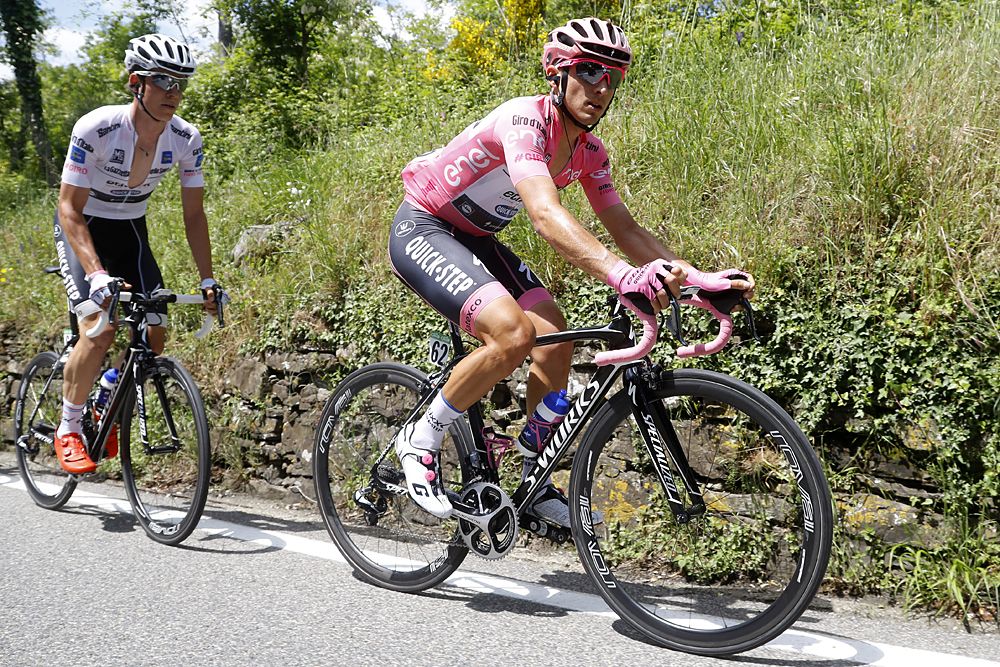 Italian cyclist Gianluca Brambilla (R) and Luxembourg's rider Bob Jungels of Etixx - Quick Step team compete during the 10th stage of the 99th Giro d'Italia