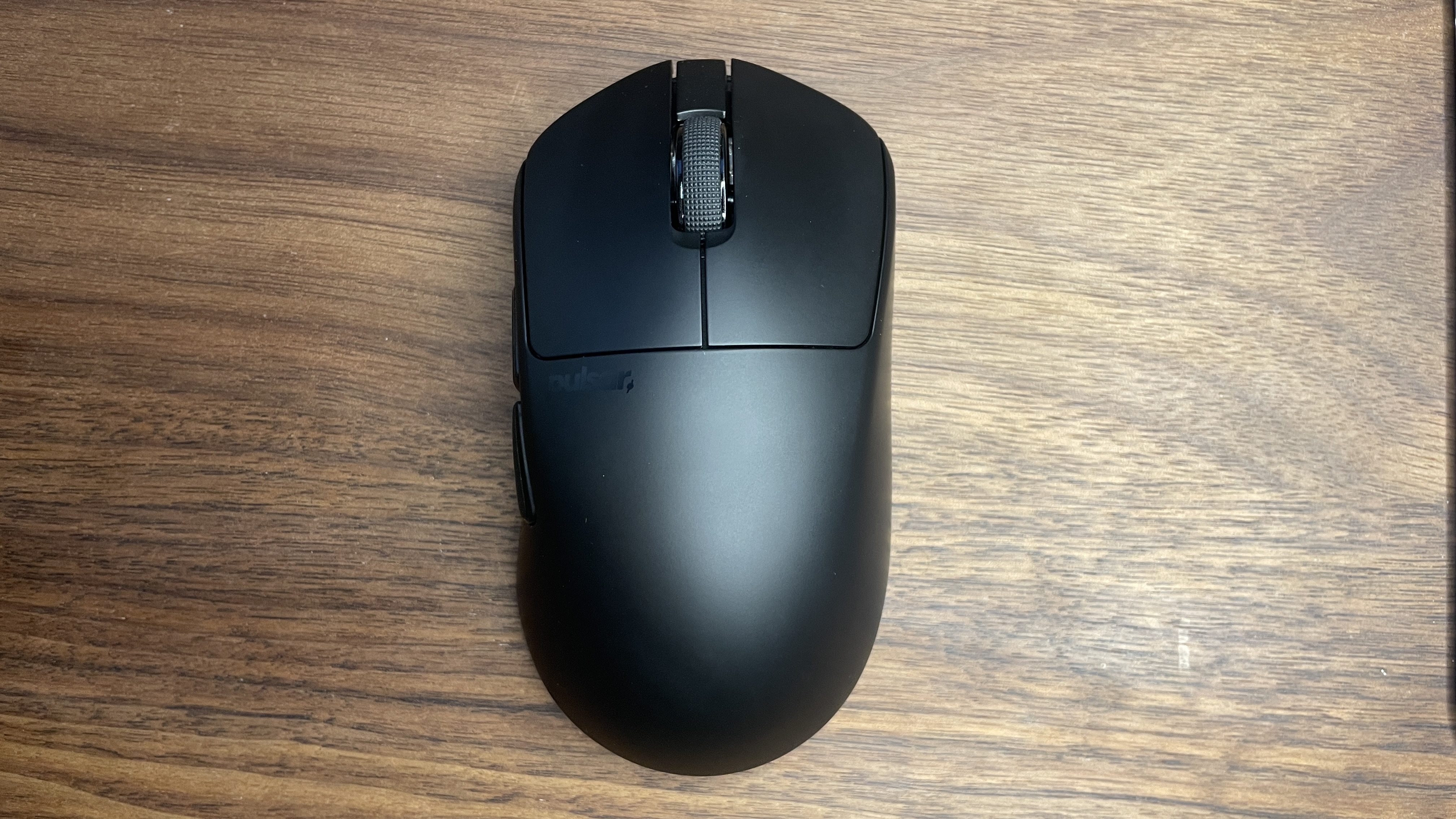 A Pulsar X3 CrazyLight Mini gaming mouse.