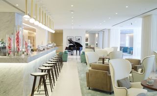Bar and lounge area with piano
