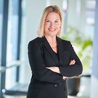 Smiling headshot of Pam Hoppel, President of Legrand | AV.
