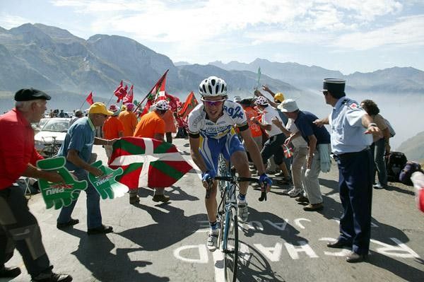 As the Tour passes through the mountains of the Pyrenees, local Basque fans line the roadside to cheer on their favourite riders.