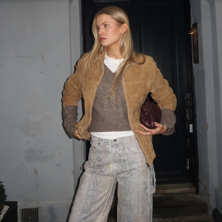 woman wearing layering outfit idea 2026