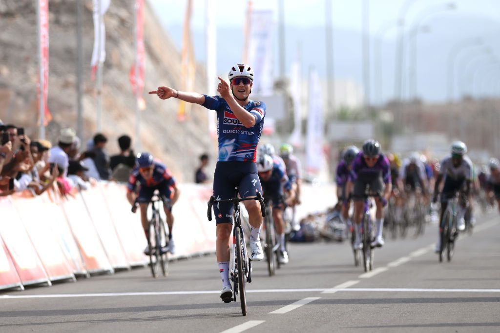 YITTI HILLS OMAN FEBRUARY 09 Louis Vervaeke of Belgium and Team Soudal QuickStep celebrates at finish line as stage winner during the 14th Tour of Oman Stage 2 a 2029km stage from Al Rustaq Fort to Yitti Hills 146m on February 09 2025 in Yitti Hills Oman Photo by Alex BroadwayGetty Images