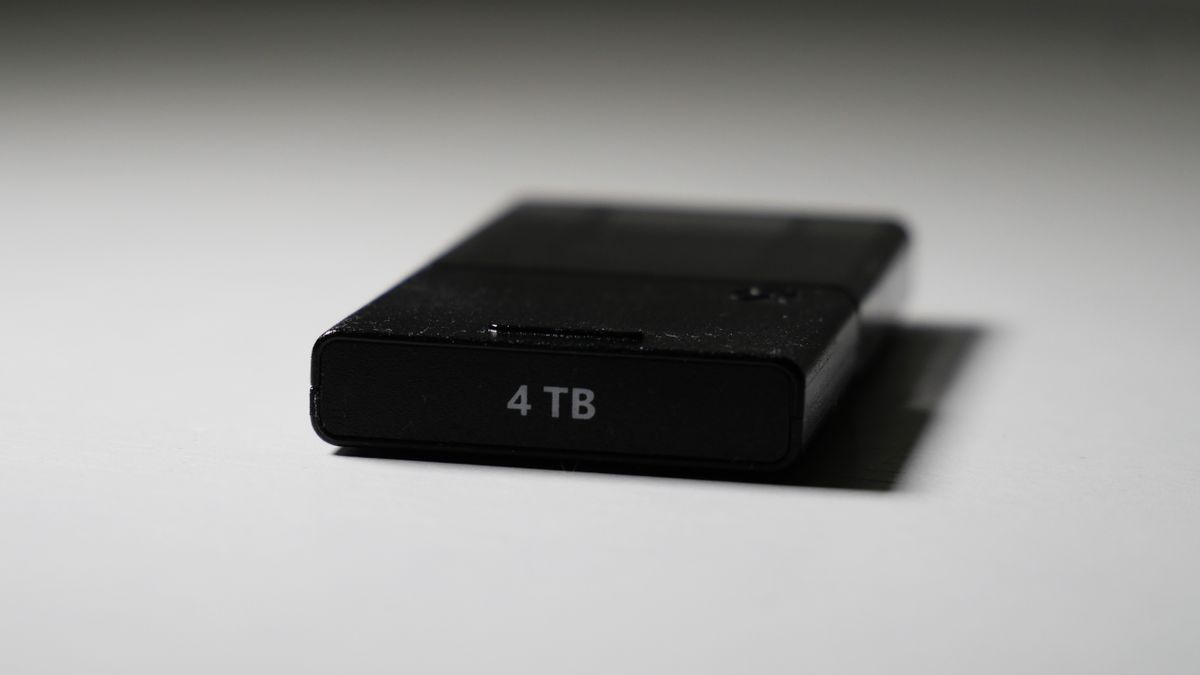 4TB Seagate Storage Expansion Card on a white desk, highlighting its light-and-thin design.