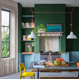Farrow & Ball Beverly green paint colour in dining room with large open windows and dining table