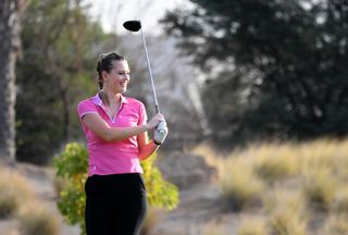 Annabel Angel hits a drive during a Pro-Am