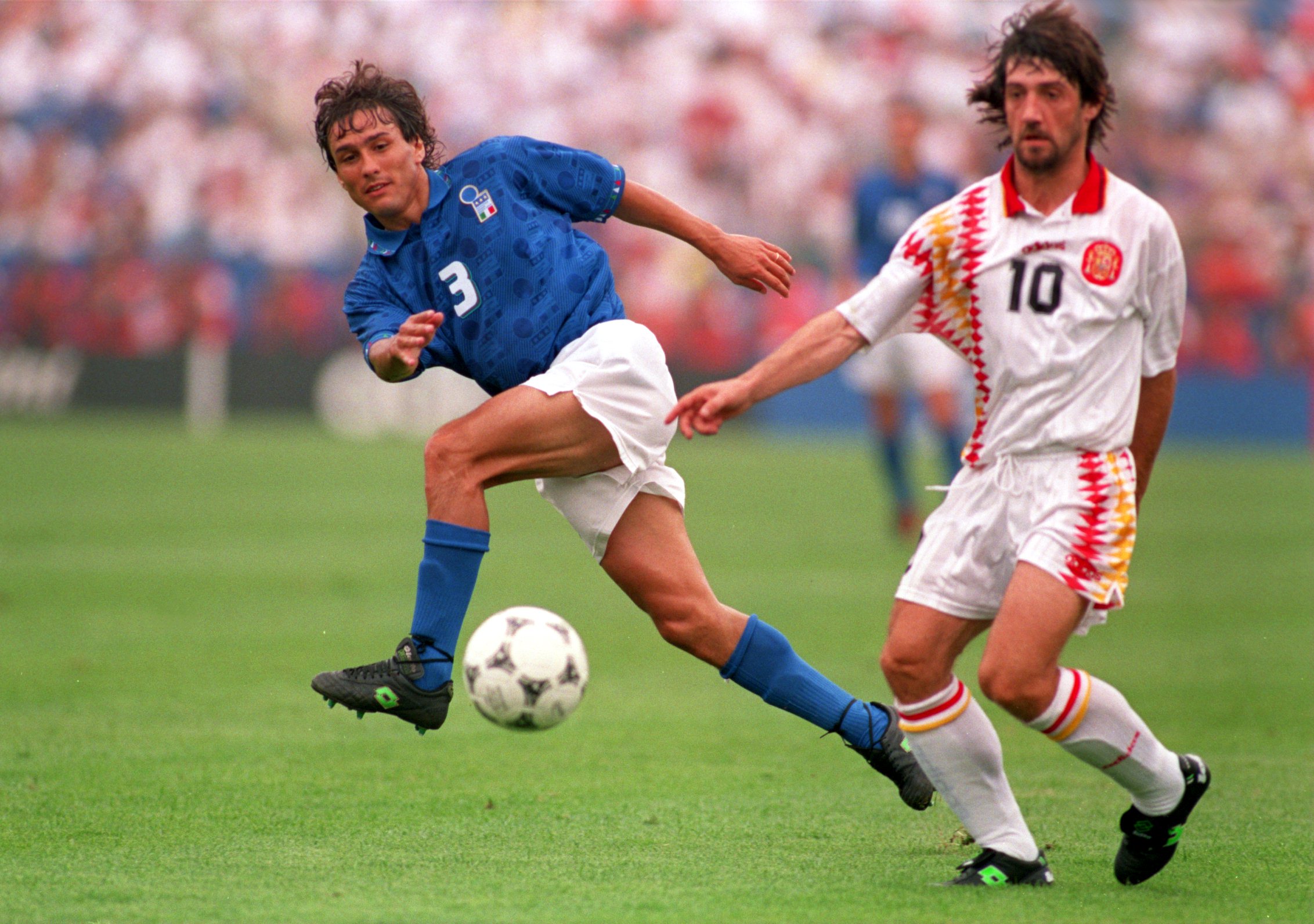 Italy's Antonio Benarrivo and Spain's Jose Maria Bakero in action at the 1994 World Cup.