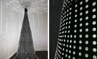 Left, a black sculptural 'dress' illuminated by over 5000 Swarovski crystals. Right, a closeup the crystals.