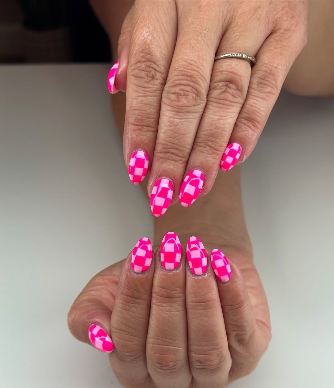 pink checkerboard nails