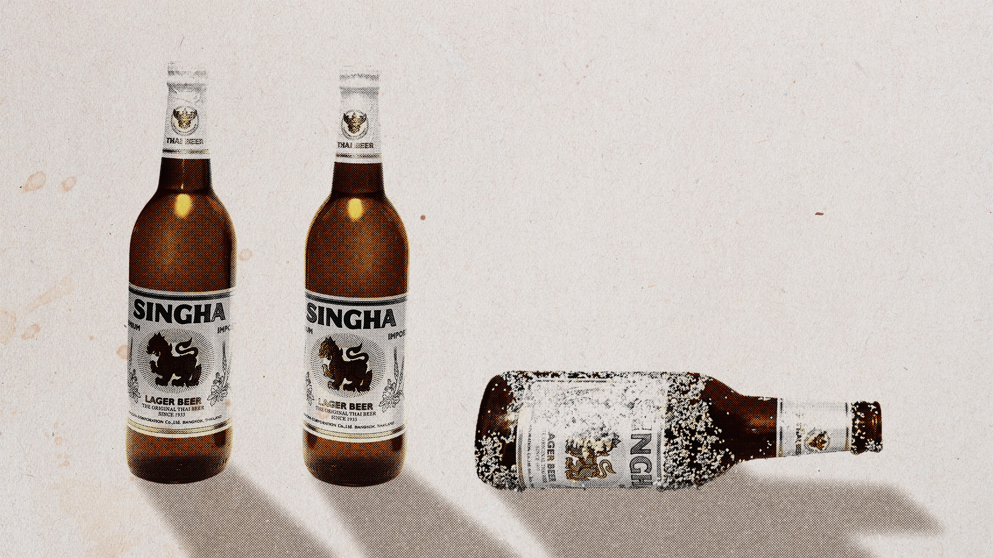 Photo collage of three Singha beer bottles. Two are standing, and a third has been knocked over.