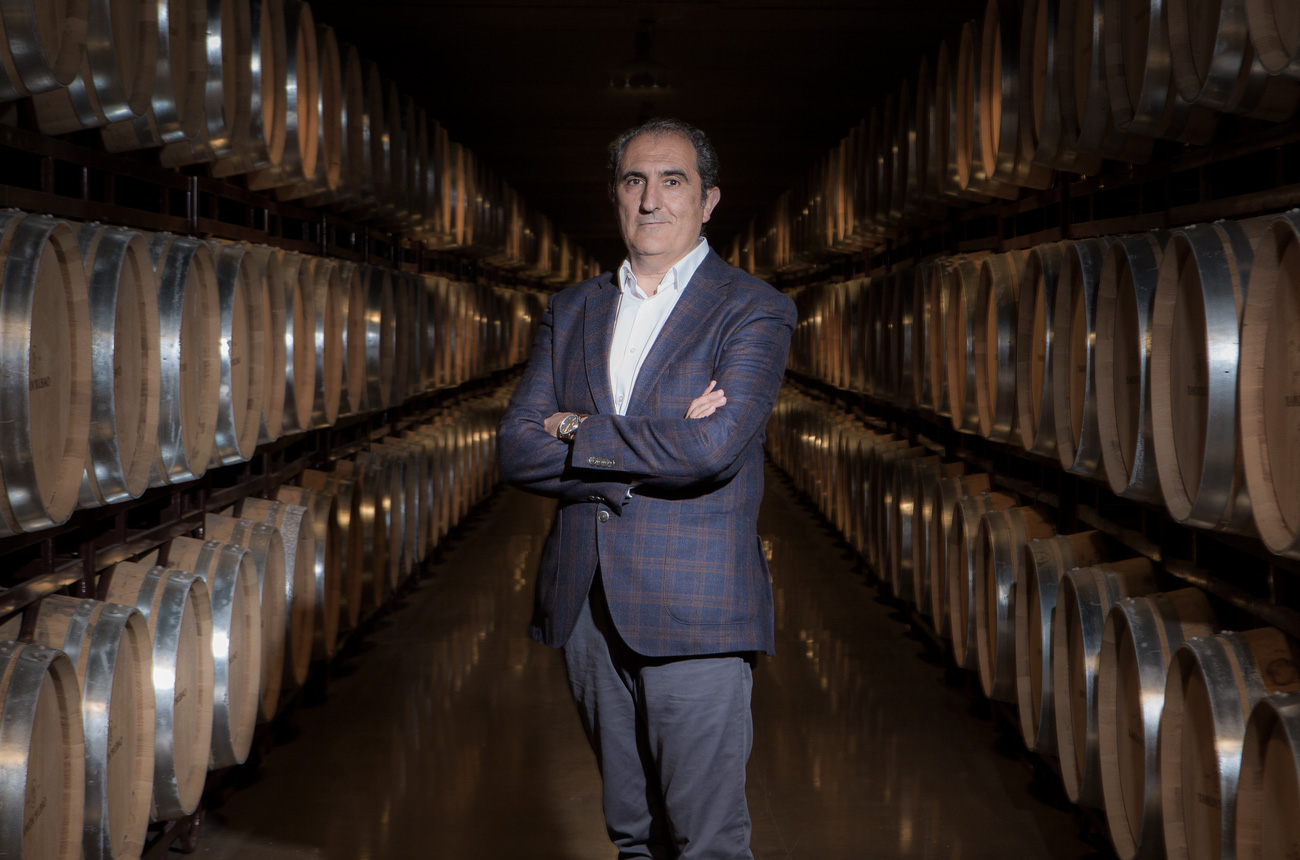 A man in a barrel cellar