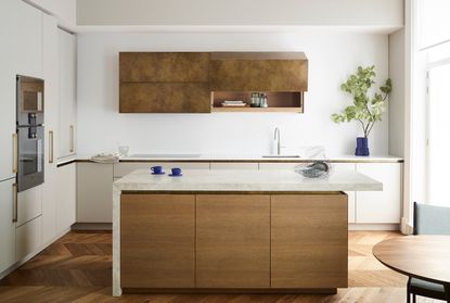 modern kitchen with marble waterfall countertop on a wood kitchen island