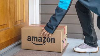 Amazon spring deals delivery person dropping off Amazon package at front door 