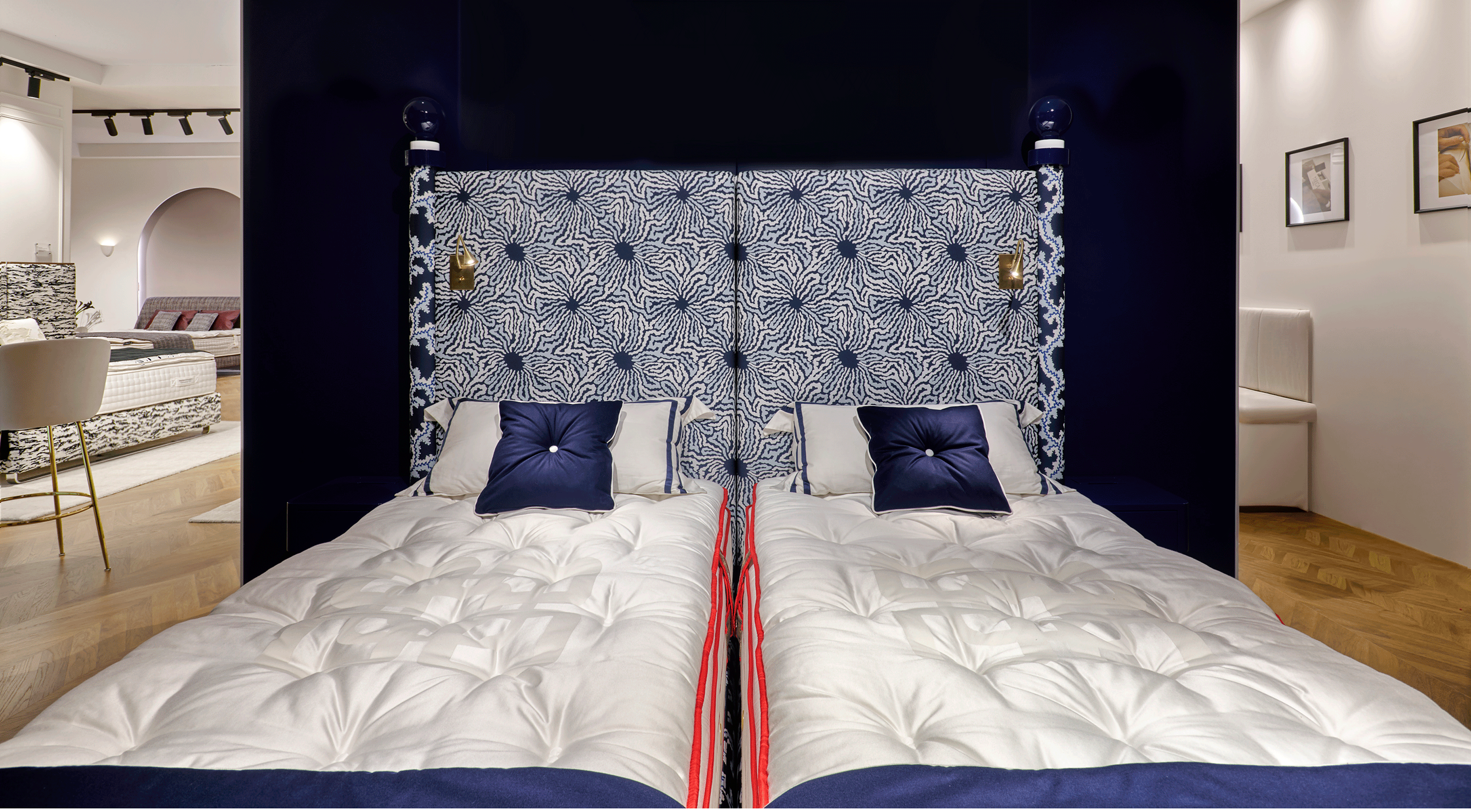 a gif of a bed separating from a king to two singles