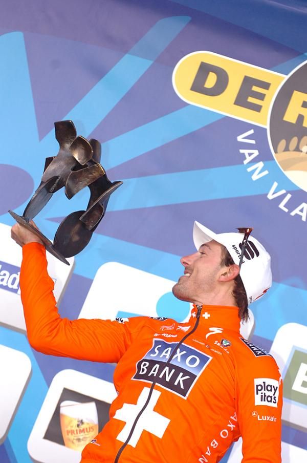 Cancellara admires his newest trophy