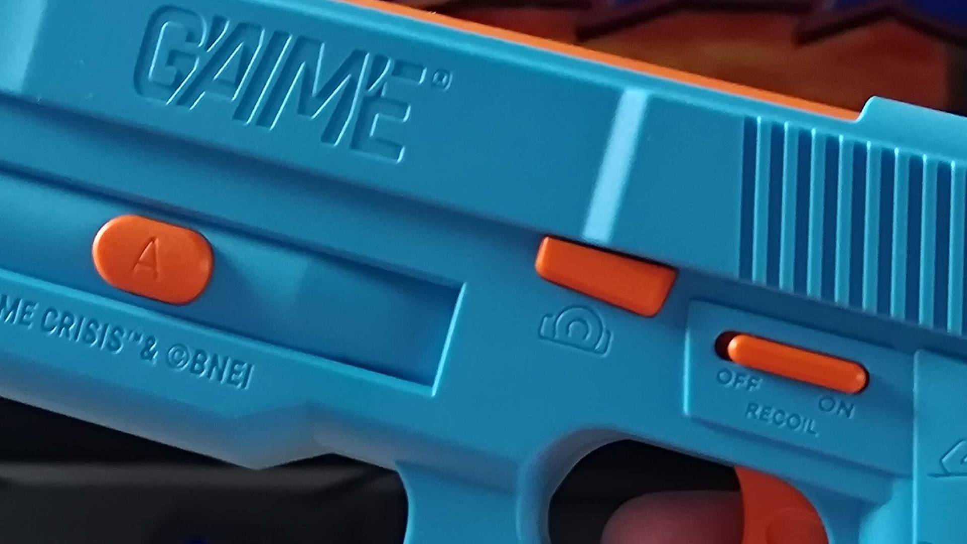 G&#039;AIM&#039;E Time Crisis Lightgun close up of buttons