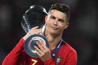 Cristiano Ronaldo celebrates with the UEFA Nations League trophy after Portugal's win over the Netherlands in the final in June 2019.