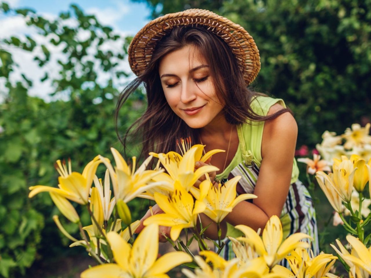 Gardener Smelling Yellow Perfumed Flowers