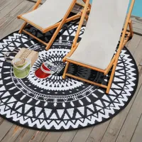 Nuu Garden Black and White 5 ft. Round Moroccan Polypropylene Indoor/Outdoor Area Rug