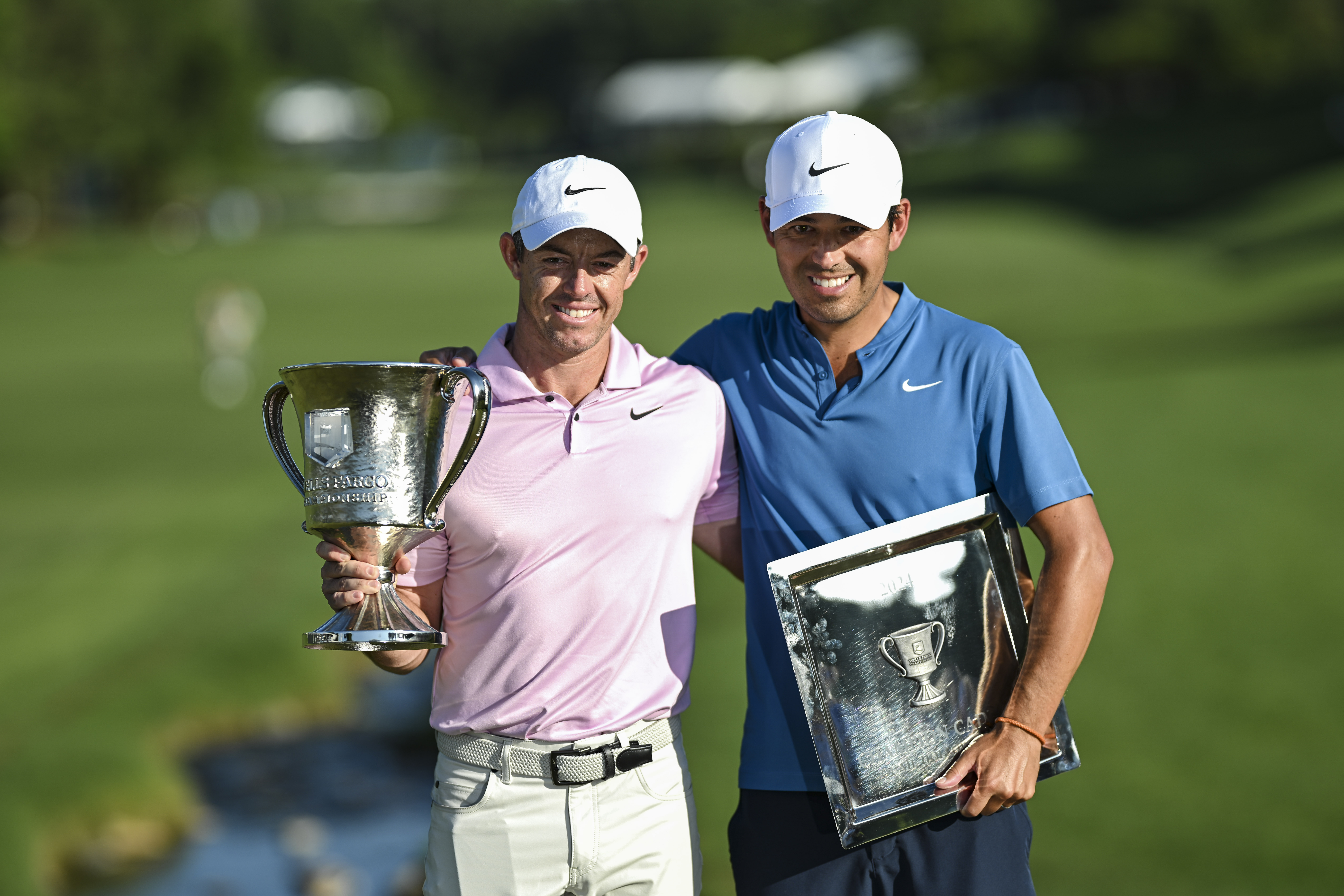 Rory McIlroy and Harry Diamond celebrate the Wells Fargo victory