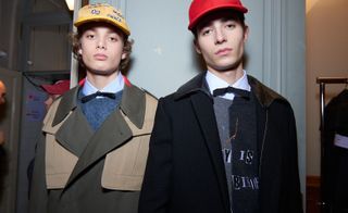 Models wearing clothing and hats by Valentino
