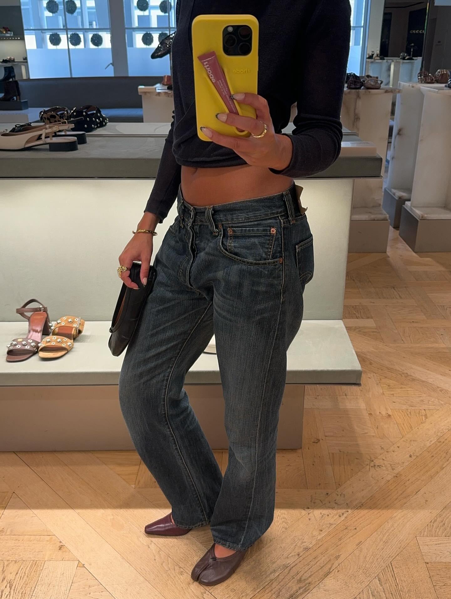 Fashion person Tegan Amelia Barker @teganameliabarker wears shoes to wear with grey jeans.