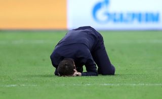 Mauricio Pochettino shows his emotion on the field after the final whistle