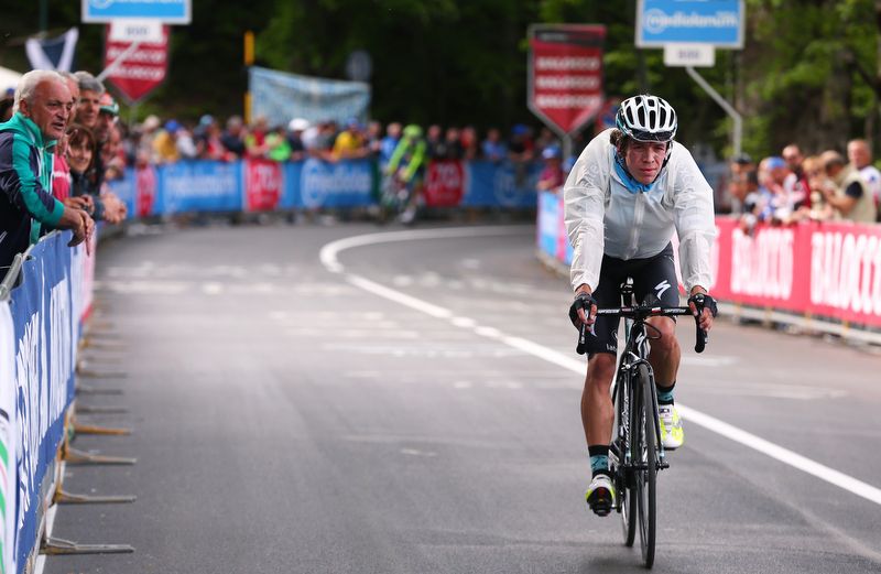 Rigoberto Uran rides the climb to the team bus