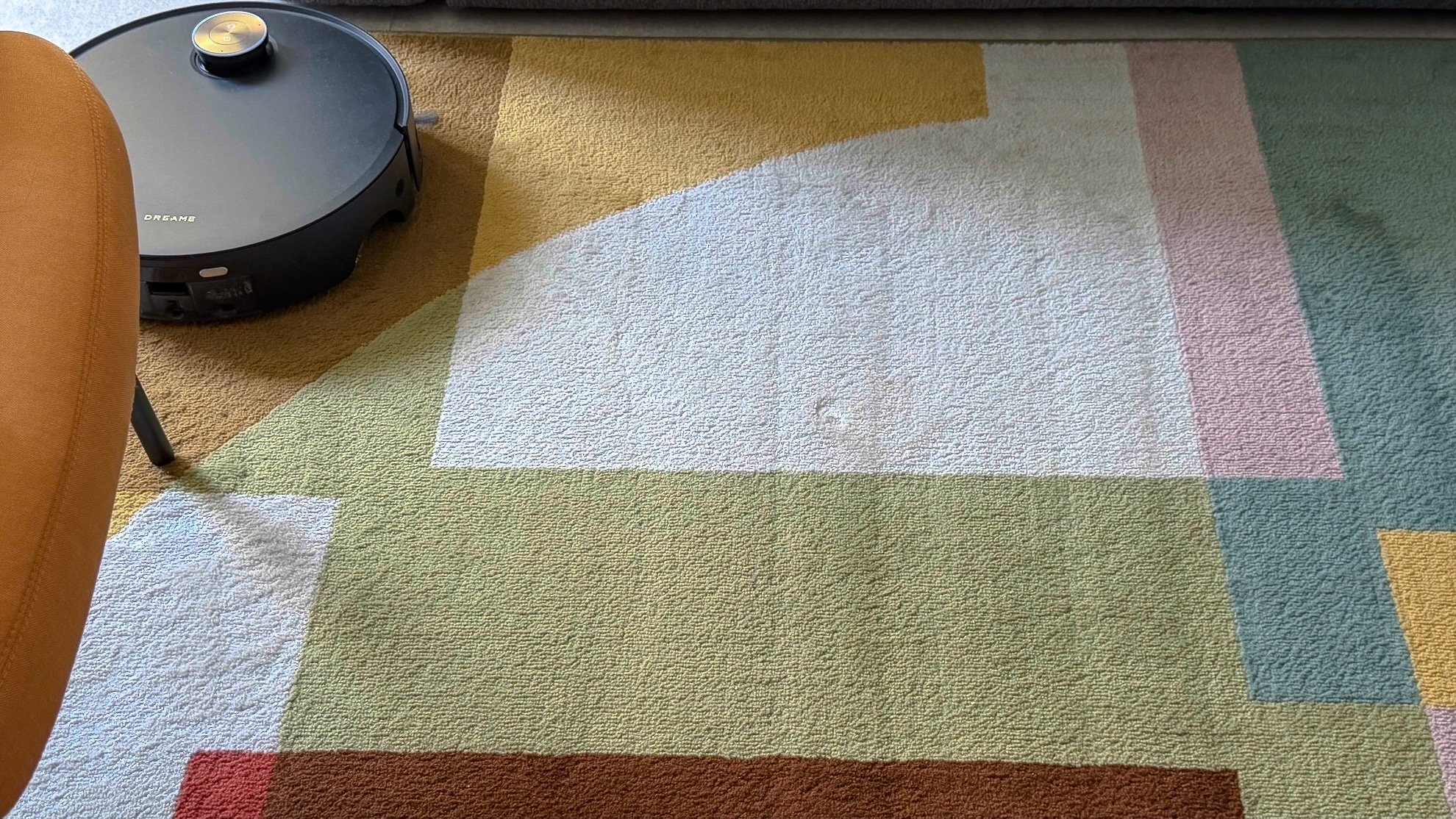 Dreame Aqua10 Ultra robot on a carpet