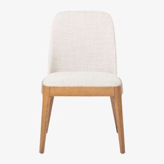 wooden dining chair with neutral upholstery