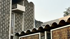 work by Joseph Allen Stein, as seen in Architourian tour, showing breeze blocks and concrete arches in tropical modernist style