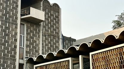 work by Joseph Allen Stein, as seen in Architourian tour, showing breeze blocks and concrete arches in tropical modernist style