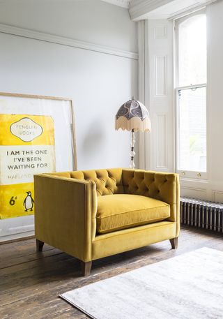 living room with yellow love seat by sofas & stuff