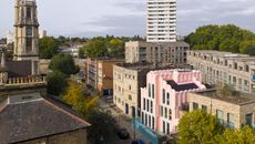 colourfully pink Cloud House by Peter Morris stands out on its street