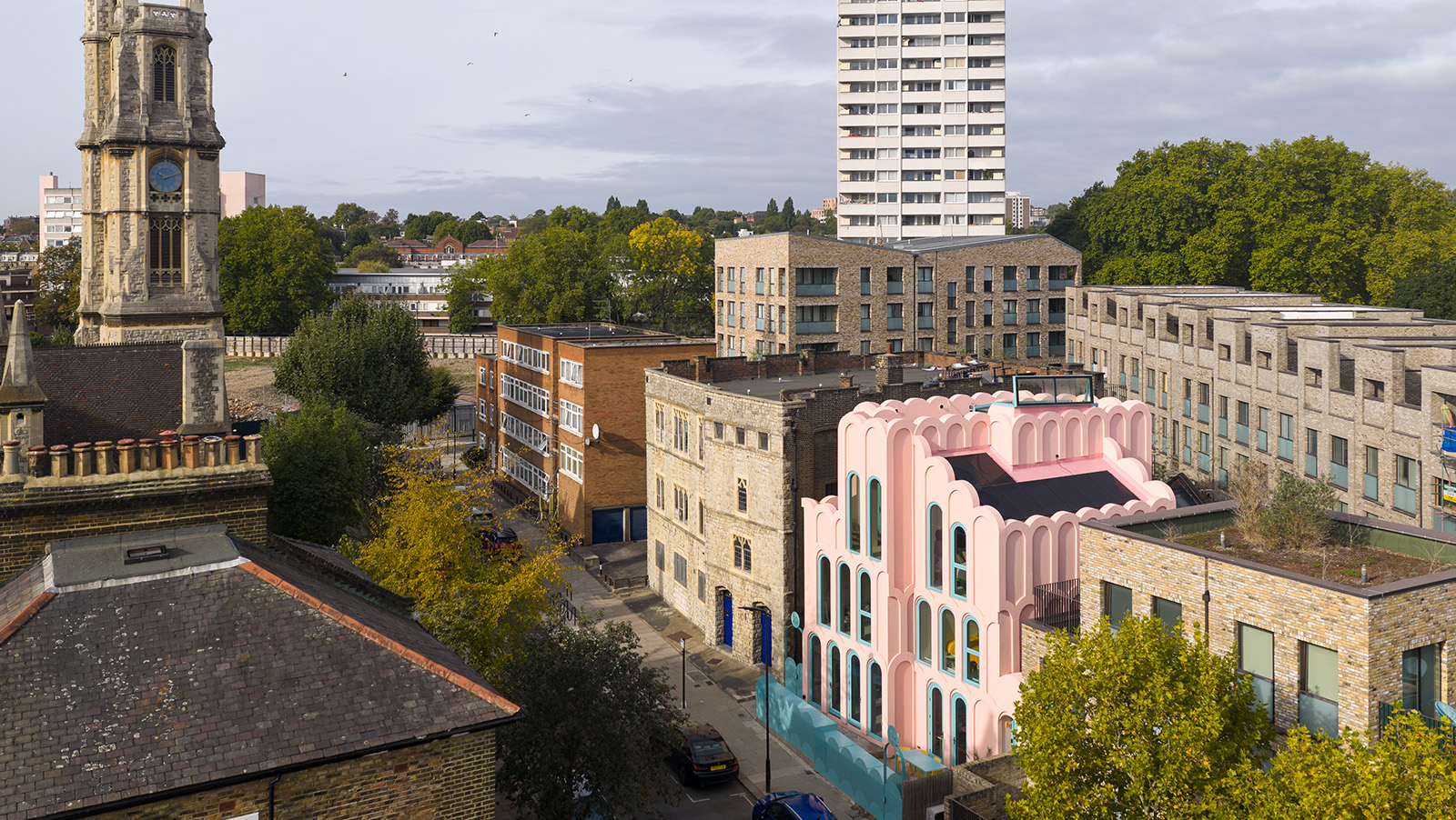 colourfully pink Cloud House by Peter Morris stands out on its street