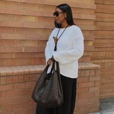 cortne bonilla wearing white sweater
