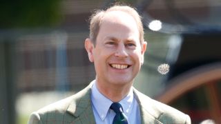Prince Edward, Earl of Wessex watches Sophie, Countess of Wessex and Lady Louise Windsor take part in 'The Champagne Laurent-Perrier Meet of the British Driving Society' on day 5 of the Royal Windsor Horse Show