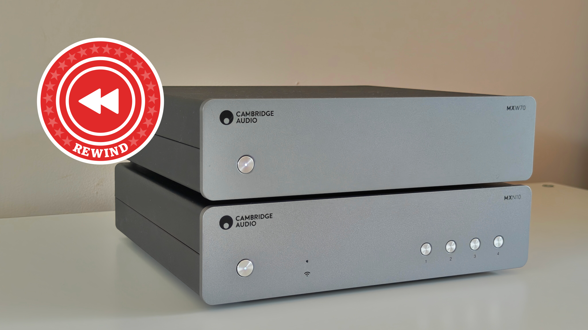 Cambridge Audio MXW70 with streamer on desk with Rewind logo