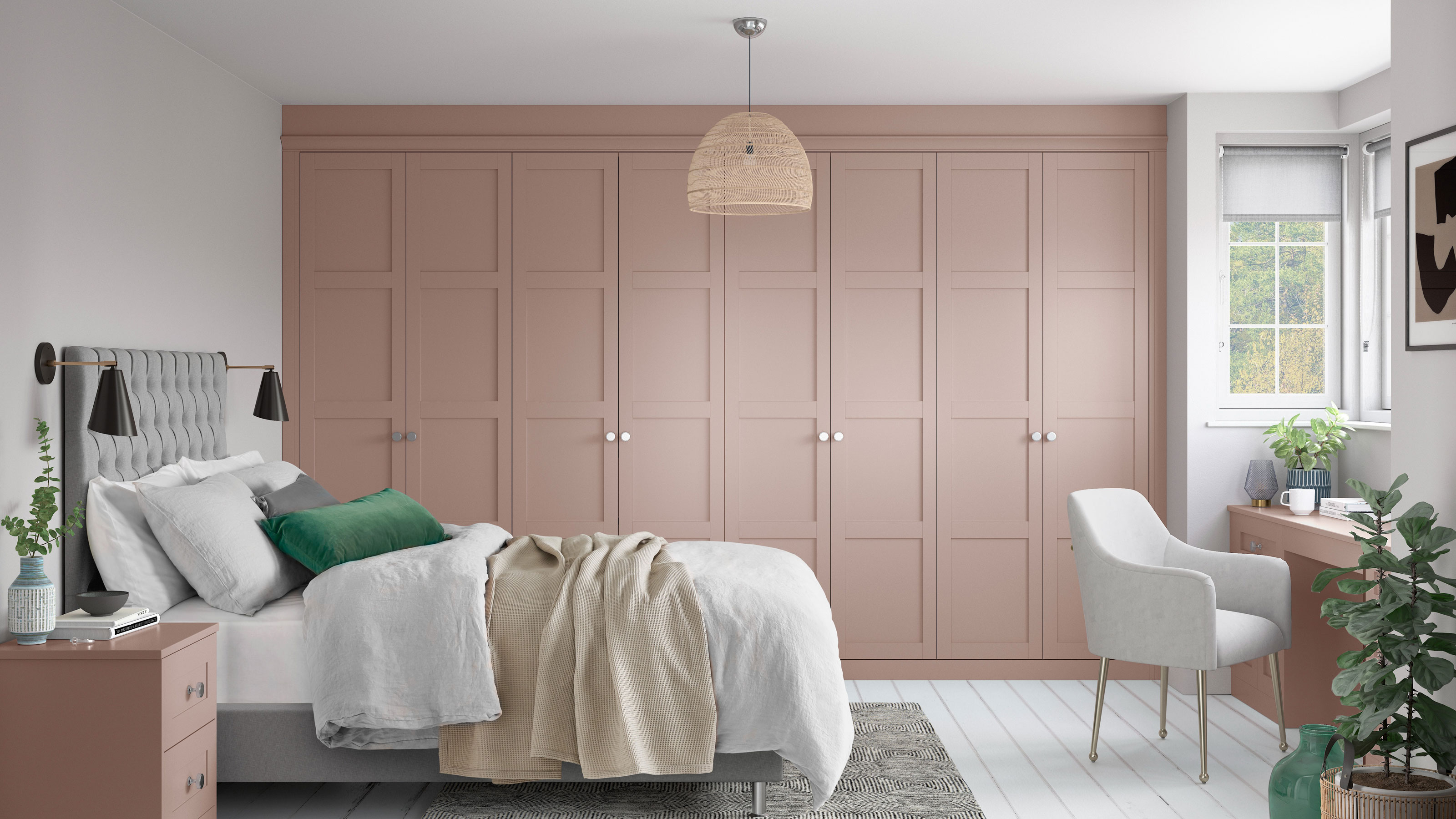 bedroom with pink fitted wardrobes and white painted floor