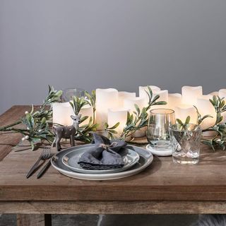 Candlelit table runner with white candles