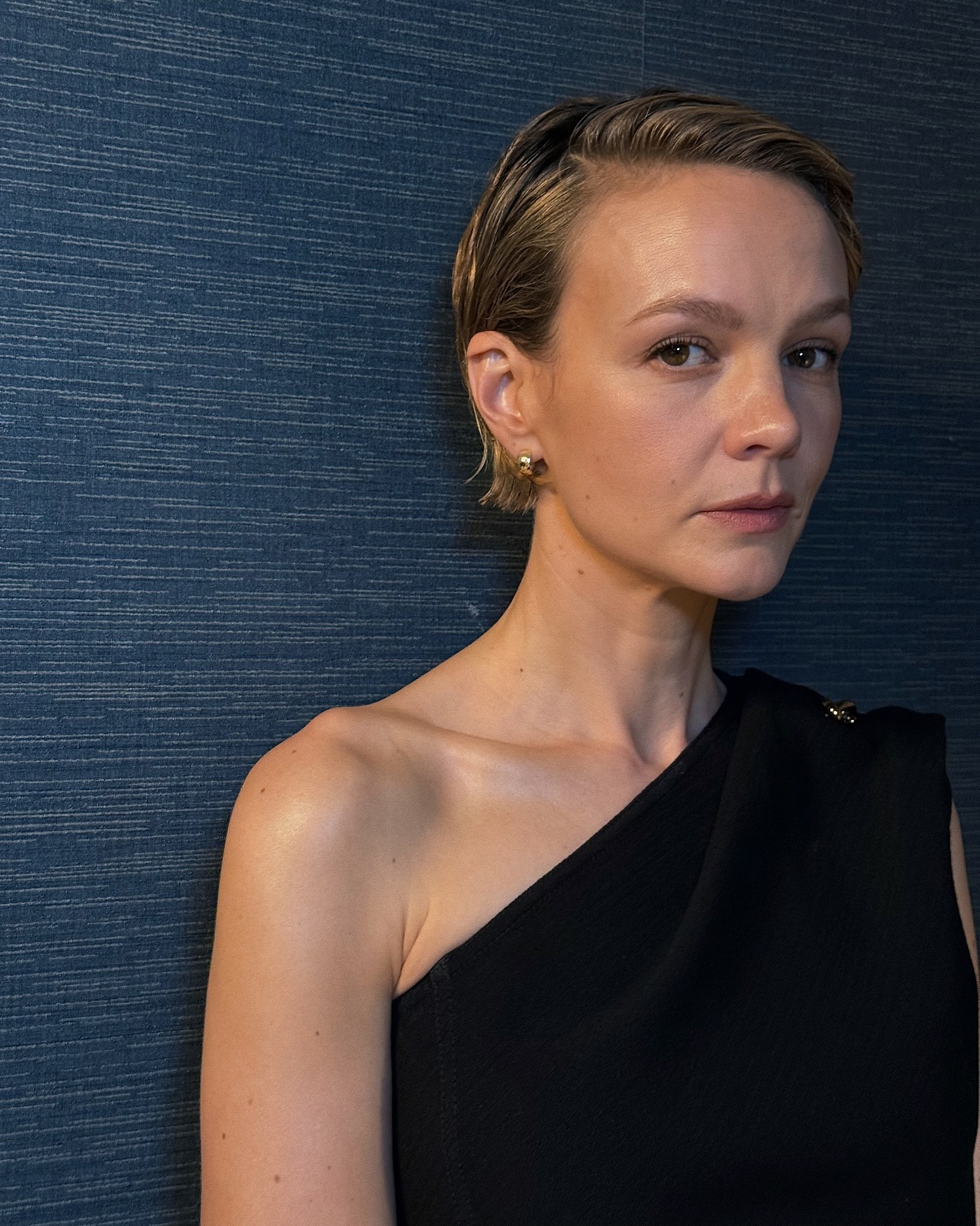 Carey Mulligan with a slicked-back bob hairstyle