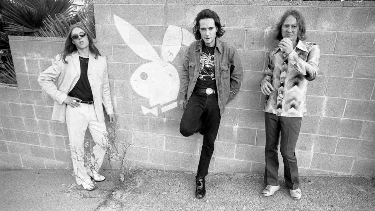 Urge Overkill posing for a photograph