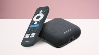 Onn 4K Pro with remote on pink background 
