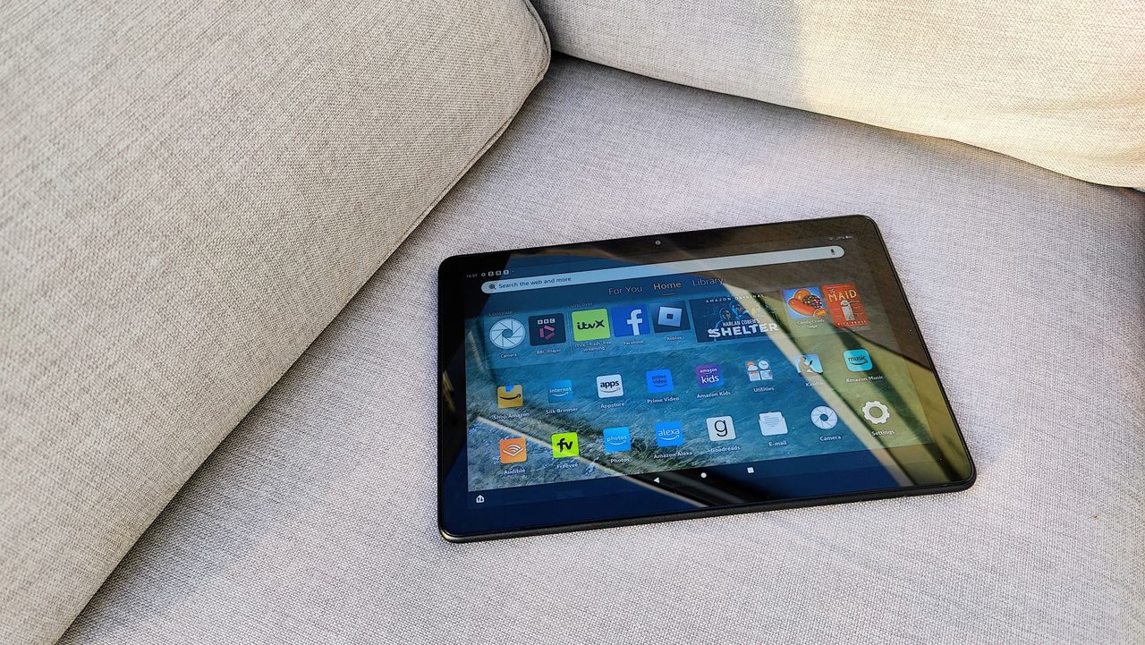 Amazon Fire HD 10 (2023) review: tablet on a sofa in the sun