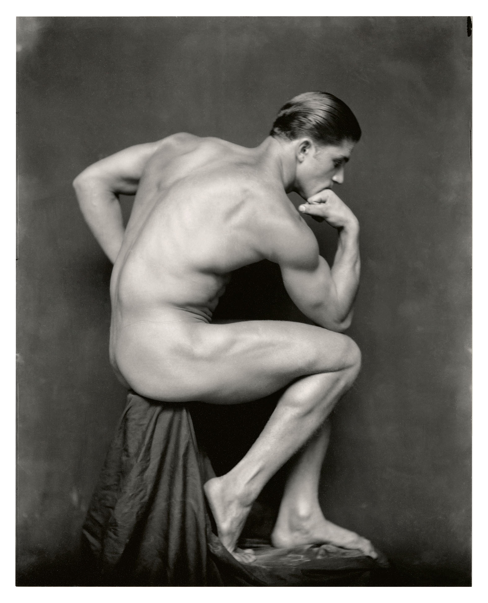 black and white image of naked men