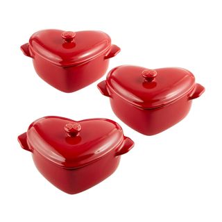 Heard shaped dishes red on table 