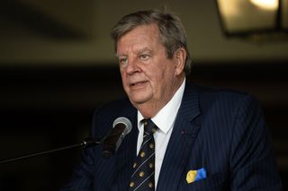 Johann Rupert addresses the crowd ahead of the 2024 African Amateur Championship